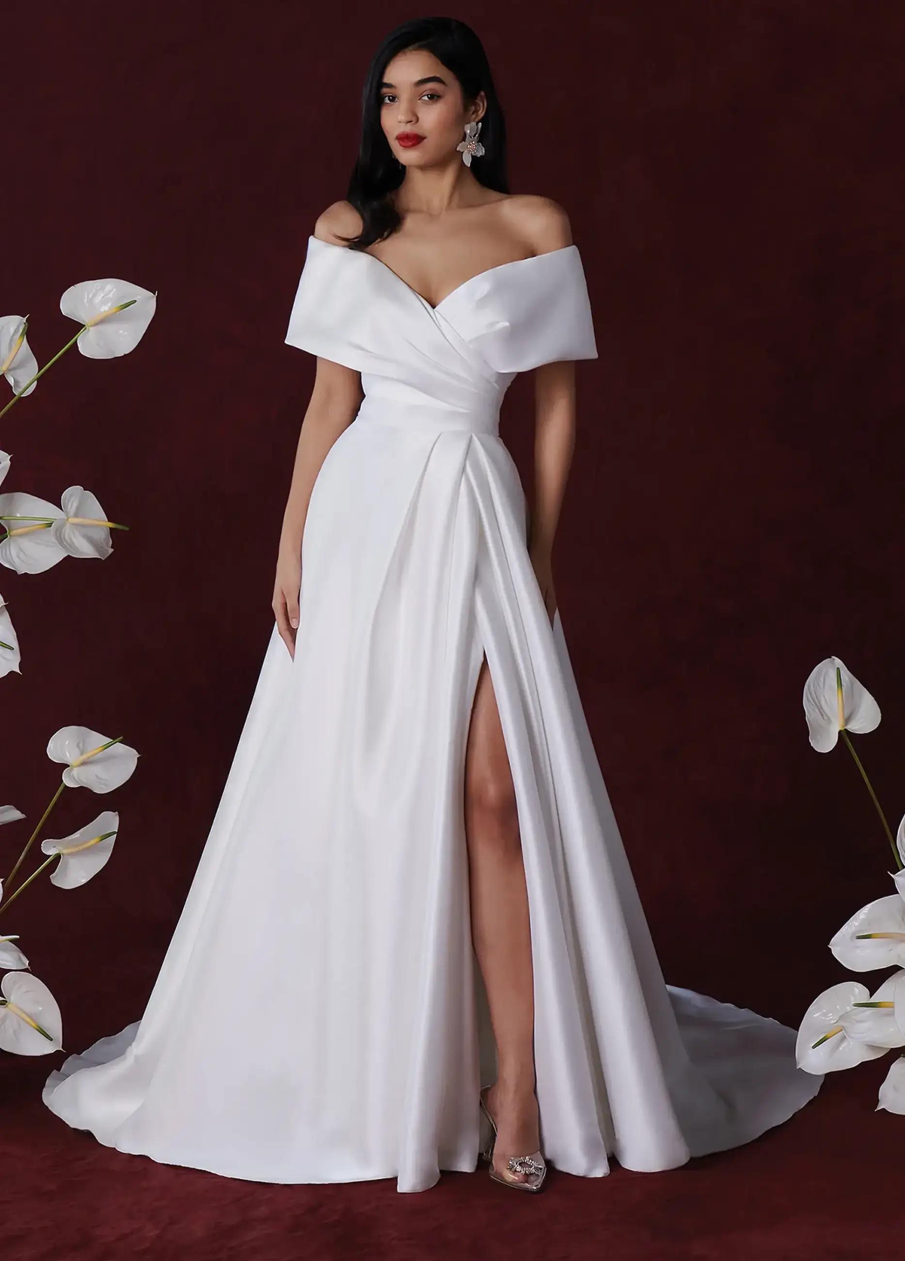 Model wearing a gown by Justin Alexander
